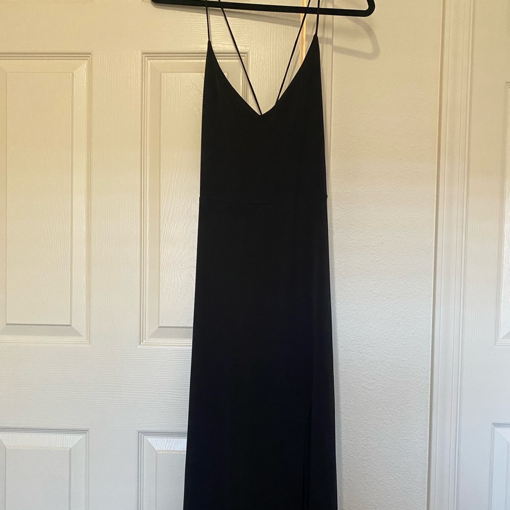 Lush black midi dress with adjustable back and leg slit